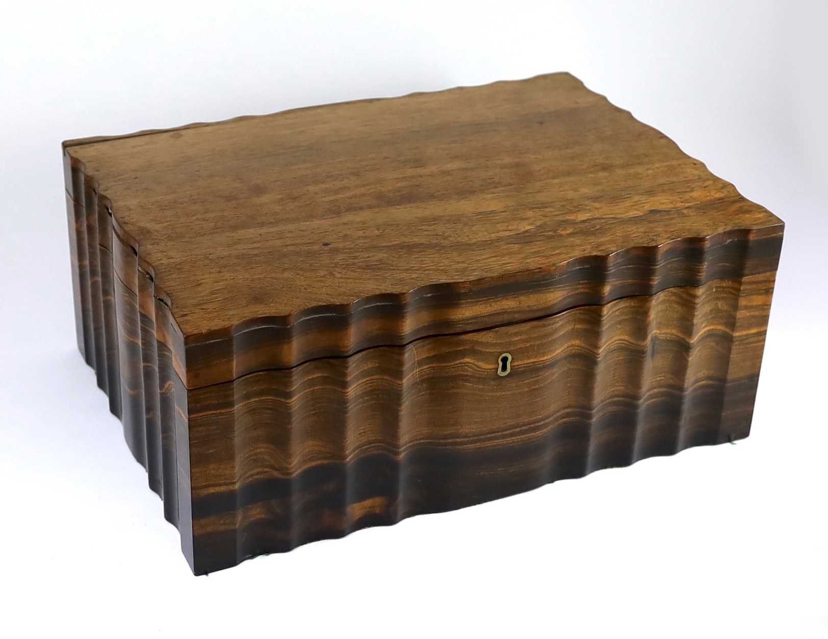 A mid 19th century Anglo Indian ivory inset ebony and other exotic hardwood travelling casket, 44cm wide 32cm deep 19cm high
